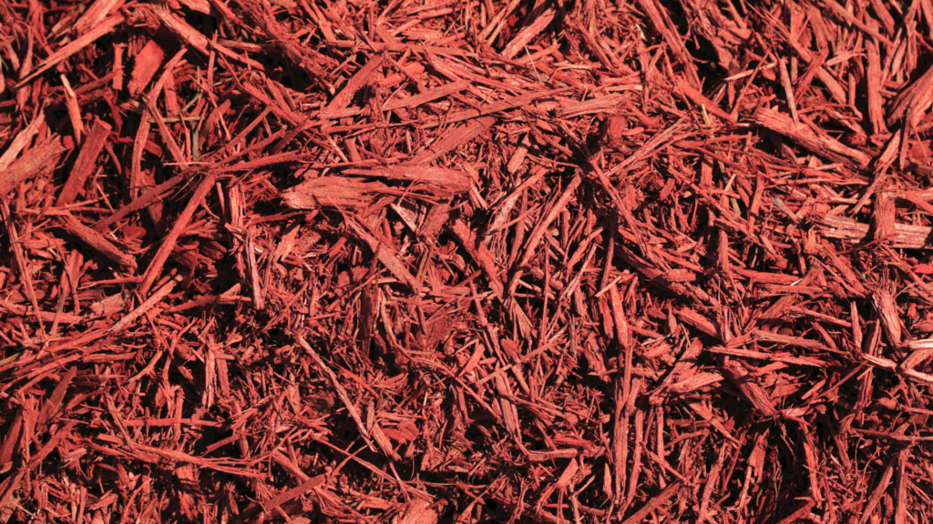 A close-up of red cedar mulch